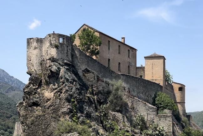 View of the citadel of Corte during a private VTC transfer from Bastia airport